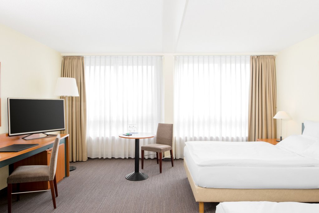 Фото Nh Fribourg Hotel