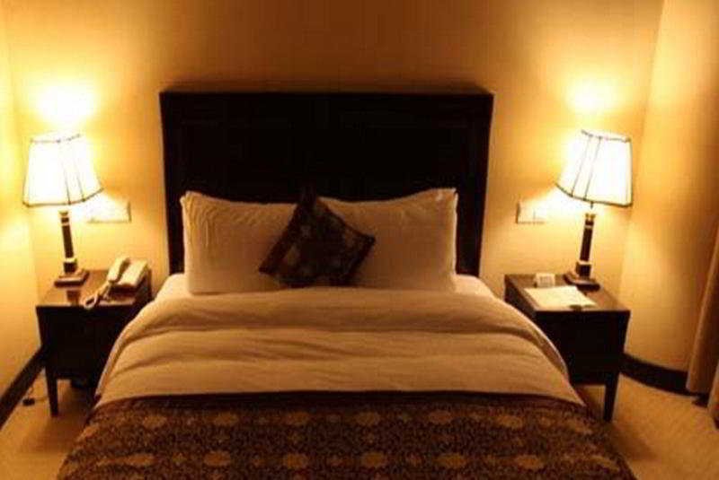 Фото Yashidu Suites Hotel