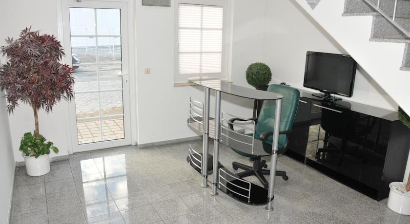 Фото Hotel Pension garni Schwerin-Unterkunft