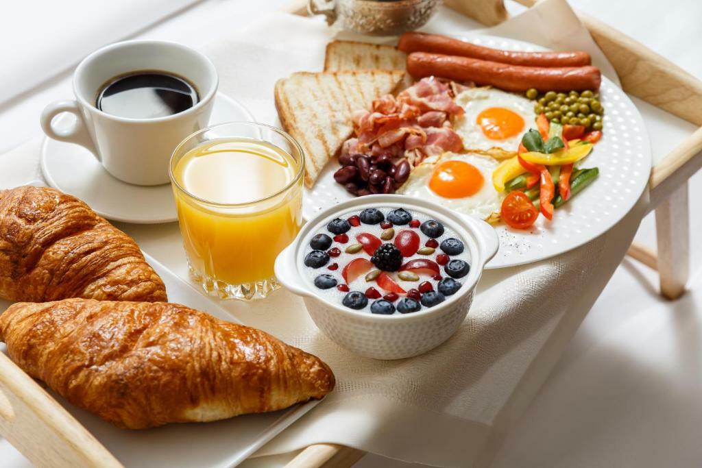 Фото The Rooms Boutique Hotel