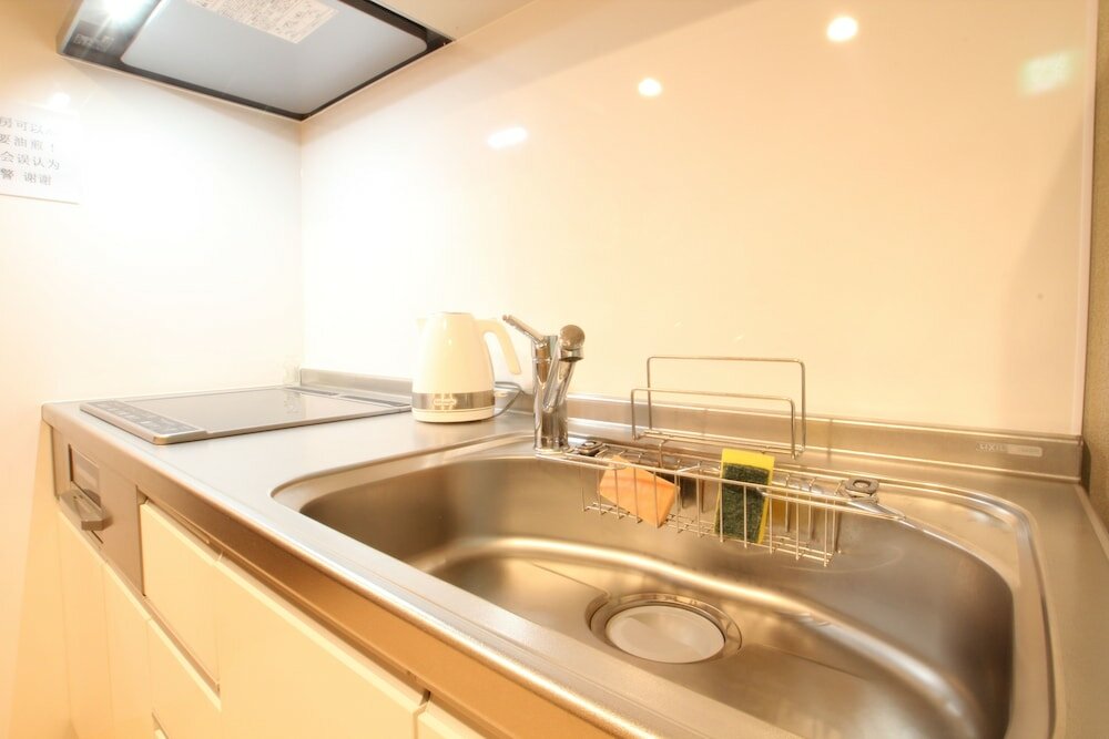 Фото Shimanouchi Luxury Apartment