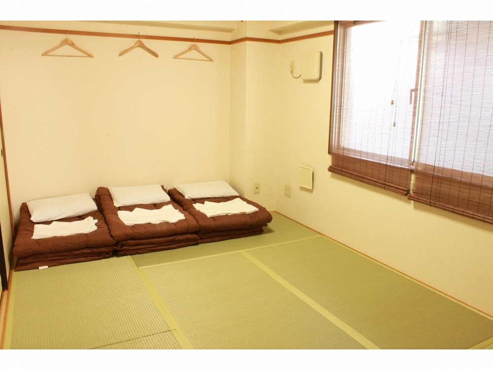 Фото T&k Hostel Kobe Sannomiya East