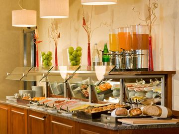 Фото Nh Fribourg Hotel