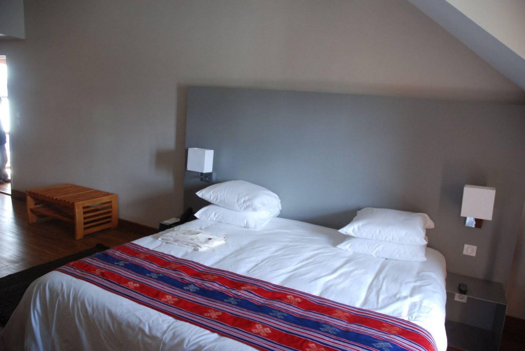 Фото Tamboho Hotel