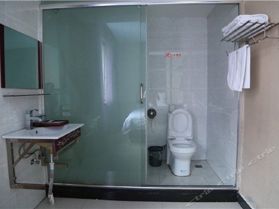 Фото Linhai Aishang Business Hotel