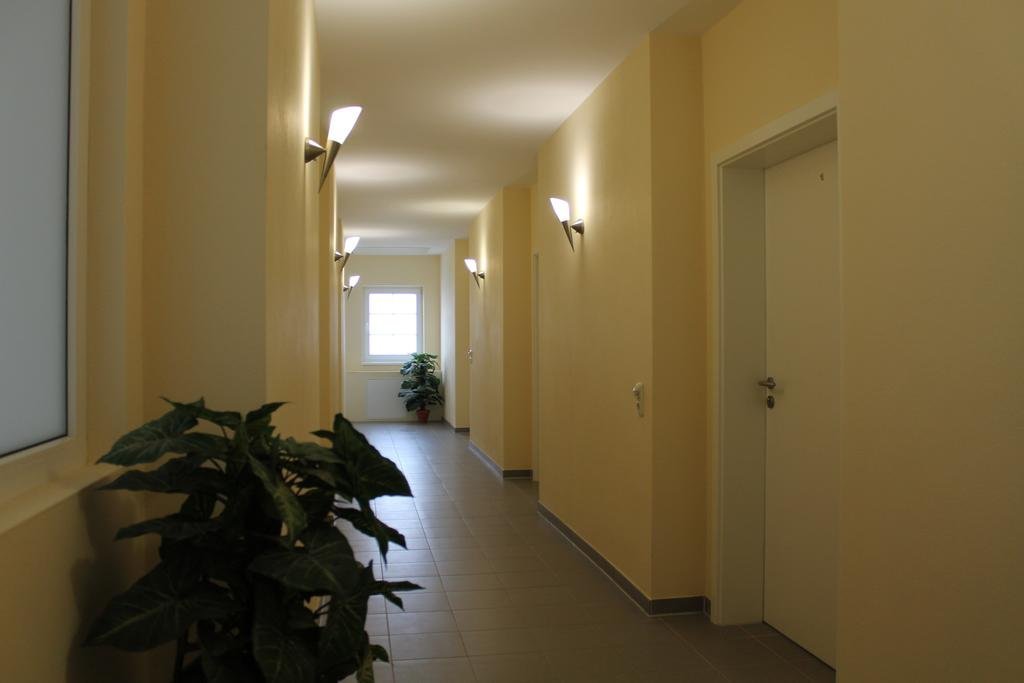 Фото Hotel Pension garni Schwerin-Unterkunft