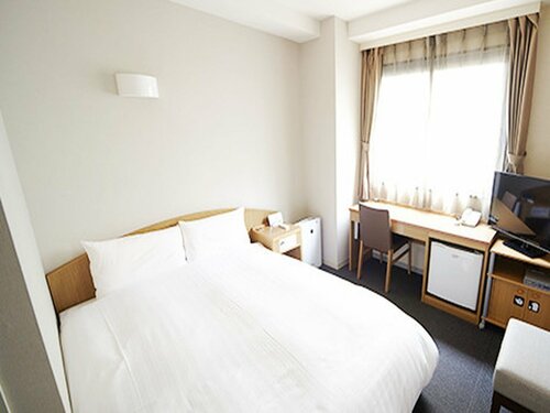 Гостиница Dormy Inn Express Sendai Hirose Dori {Formerly Dormy Inn Sendai Honkan} в Сендае