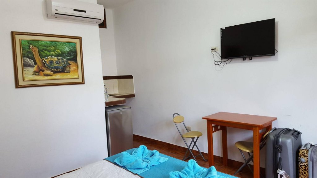 Фото Coloma Galapagos Hostal