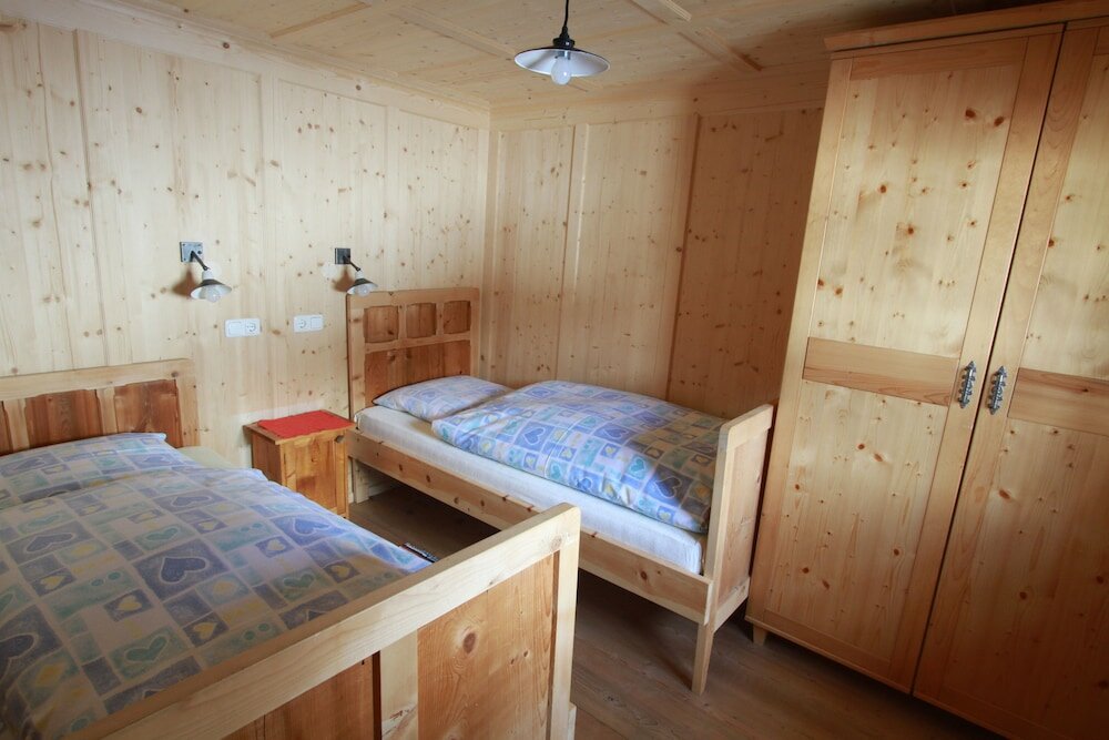 Фото Ferienwohnungen am Berg - Almhütte Alfen