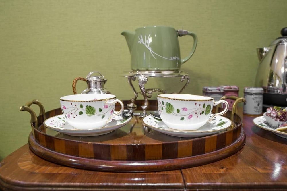 Фото Coach House Boutique B&b