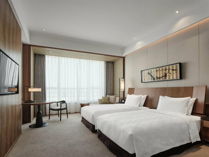 Фото Hualuxe Ningbo Harbor City, an Ihg Hotel
