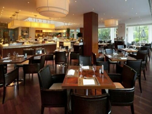 Внешний вид отеля The Dragon Hotel Hangzhou в Ханчжоу, фото 5