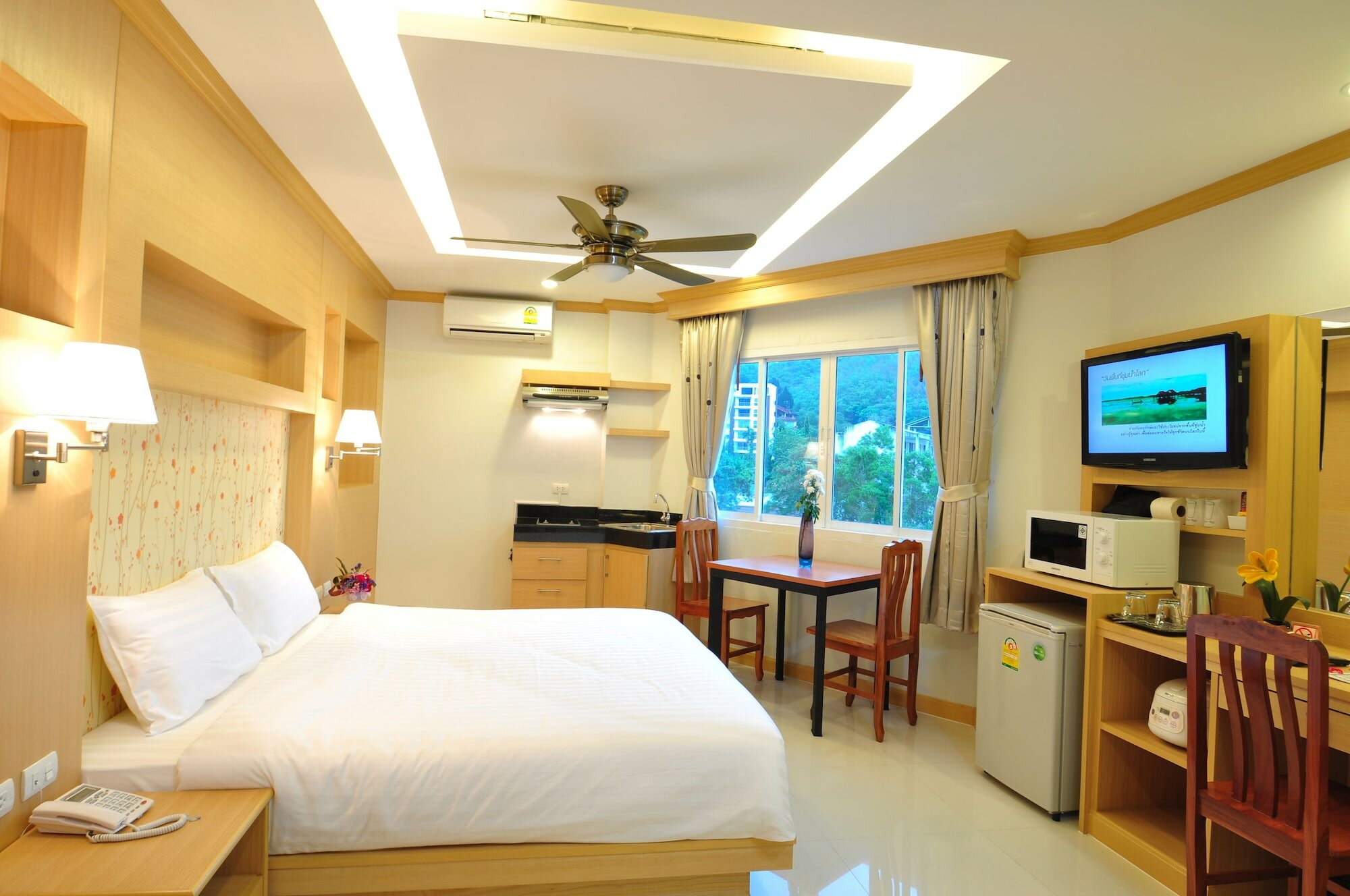 Фото Green Harbor Hotel & Service Apartment