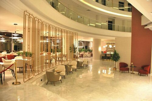 Гостиница Ramada by Wyndham Bucharest Otopeni Airport в Отопени