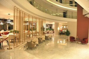 Гостиница Ramada by Wyndham Bucharest Otopeni Airport в Отопени
