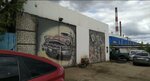 Тут и там (Kabelniy Drive, 4к4) ، ورشة لتصليح السيارات
