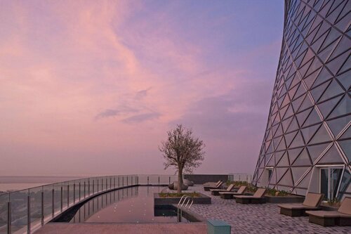 Гостиница Andaz Capital Gate в Абу-Даби