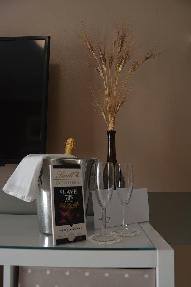 Фото Residencial La Quinta Park Suites