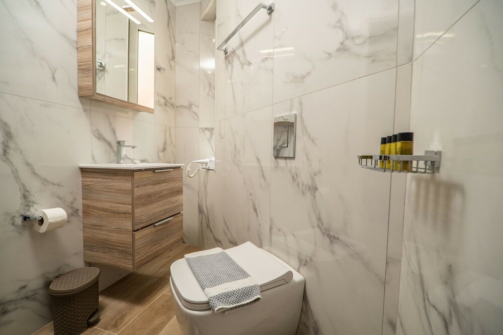 Фото Manos Beachside Apartments