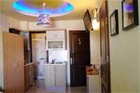 Фото Captain's Beach Boutique Apartments