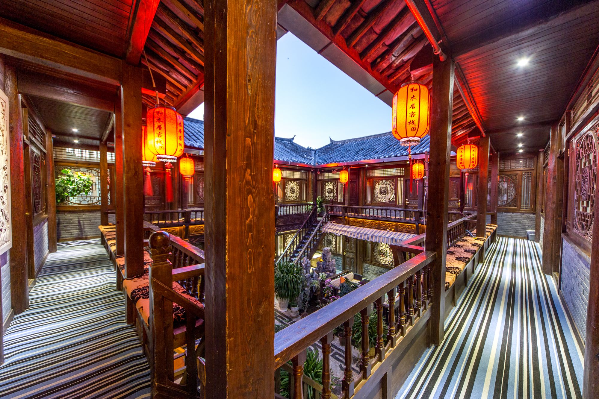 Фото Li Jiang Hemuju Inn
