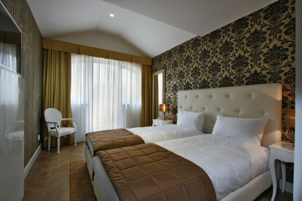 Фото Numa i Flow Rooms & Apartments