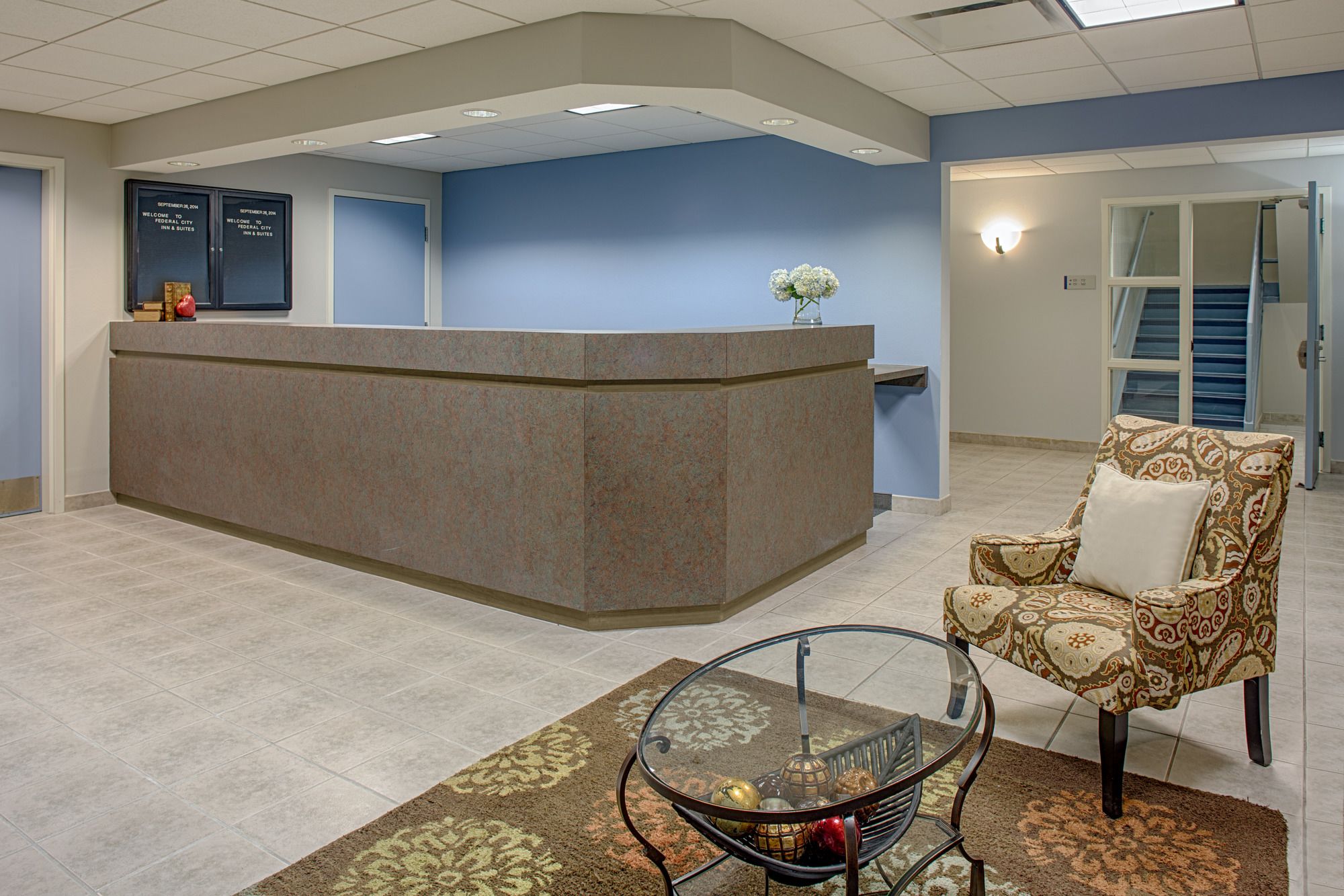 Фото Federal City Inn & Suites