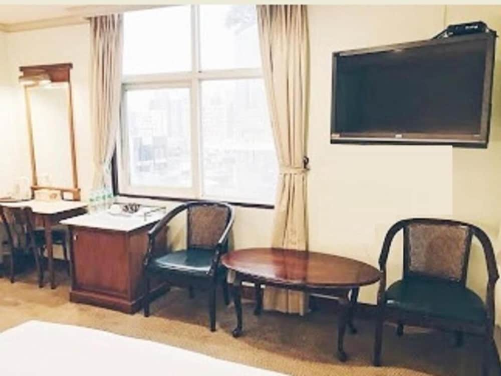 Фото Puyisy Business Hotel