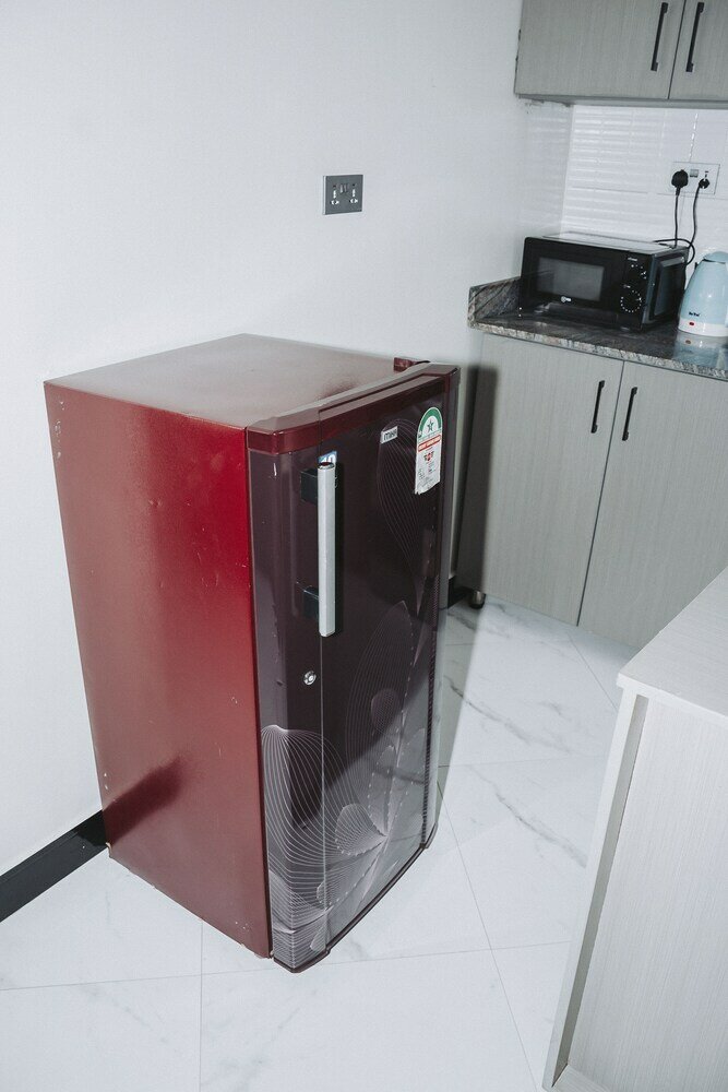 Фото Cozy Oasis Kyanja