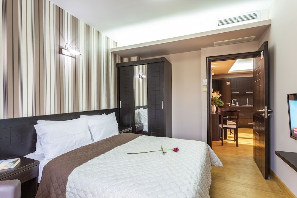 Фото CityHome Aparthotel