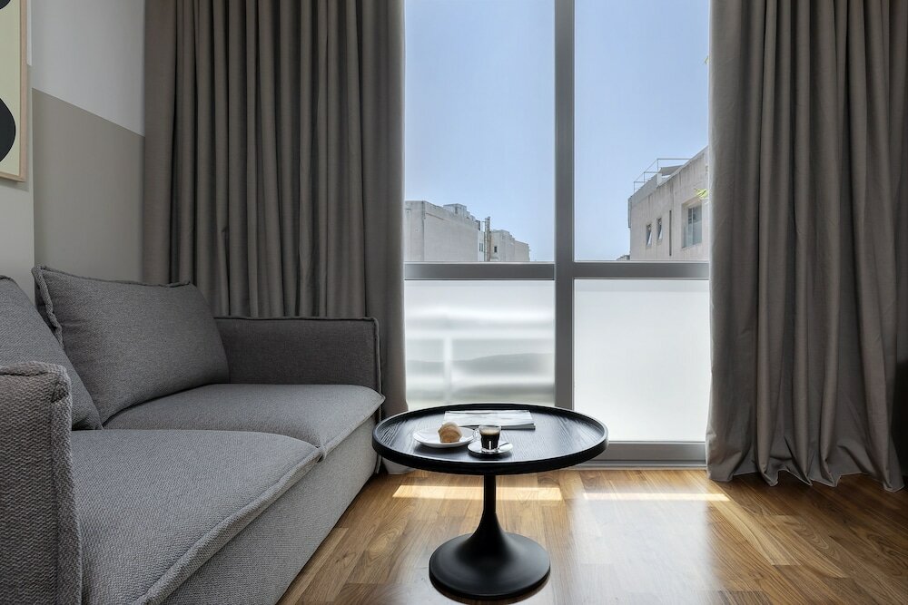 Фото The Athenians Art Apartments