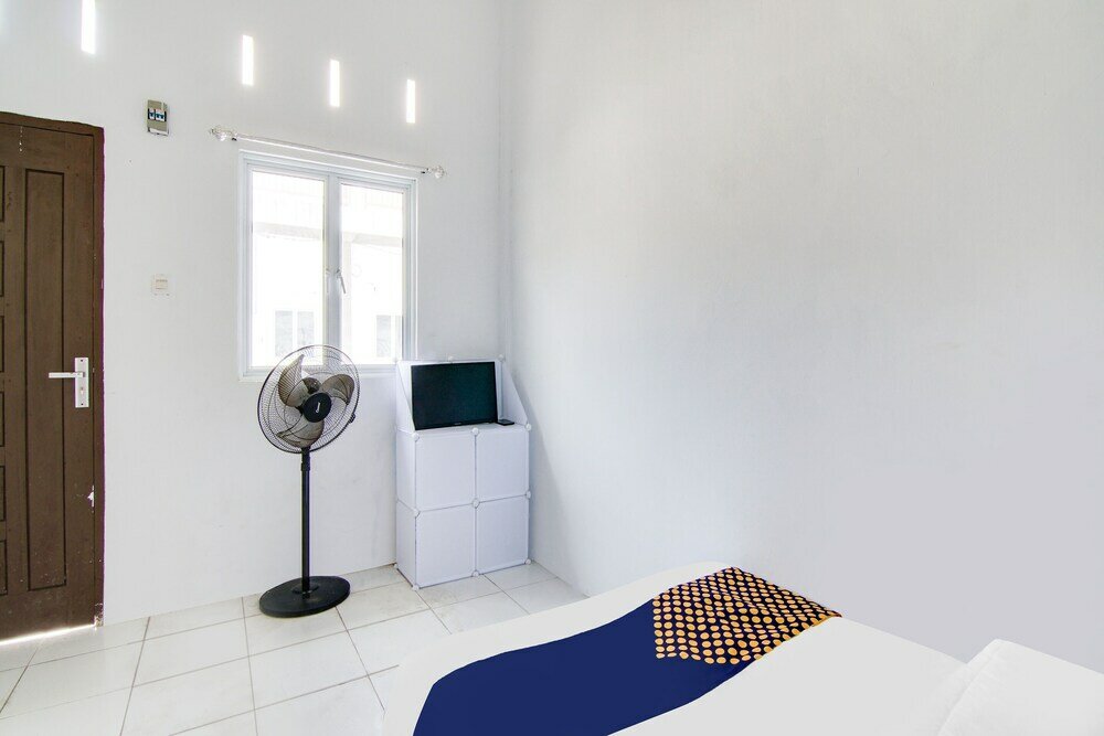 Фото Spot On 91858 Raja Homestay Syariah