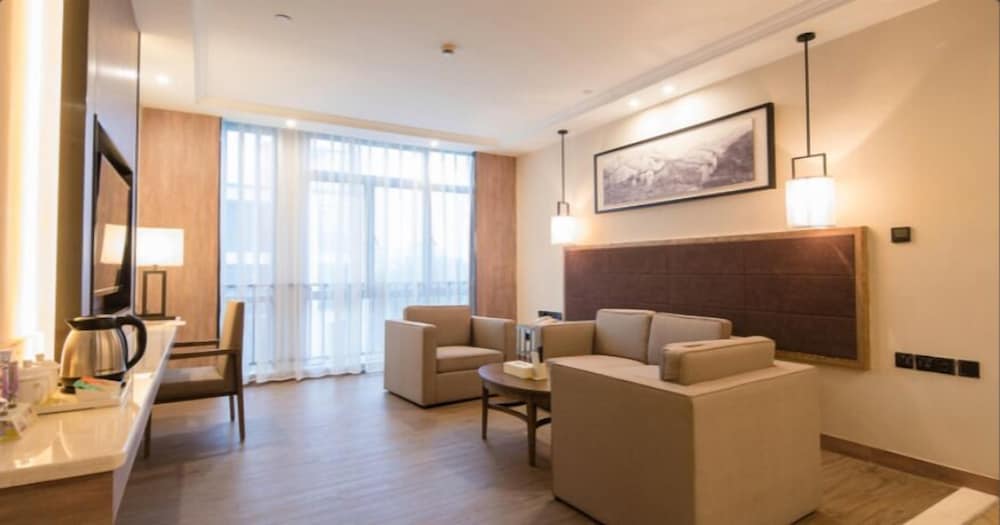 Фото Auden International Hotel