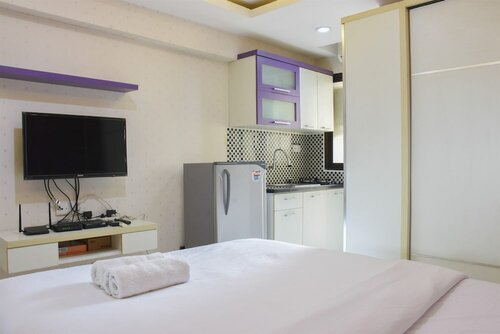 Гостиница Homey and Simply Studio Room at Kebagusan City Apartment в Джакарте
