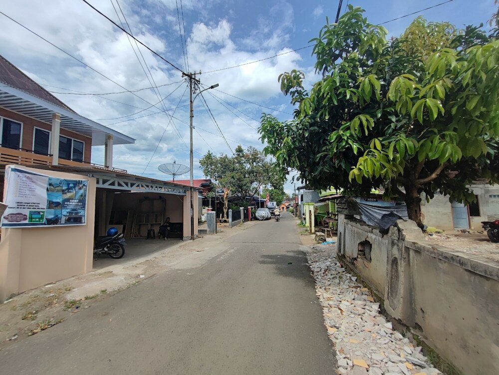 Фото Oyo 92357 Zzip Homestay