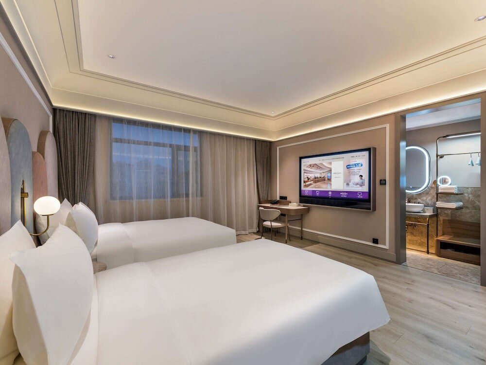 Фото Mercure Qingdao Downtown