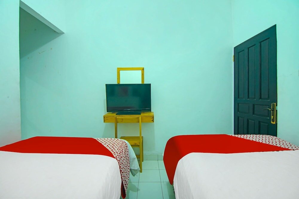 Фото Oyo 91730 De' Mande Homestay Syariah
