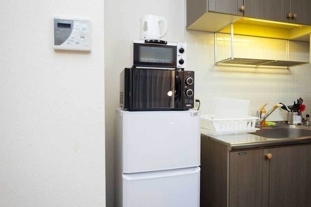 Фото Shinsaibashi Midtown Apartments