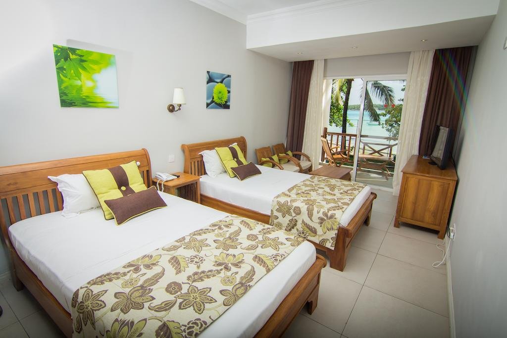 Фото Le Peninsula Bay Beach Resort