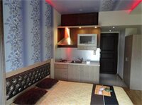 Фото Captain's Beach Boutique Apartments