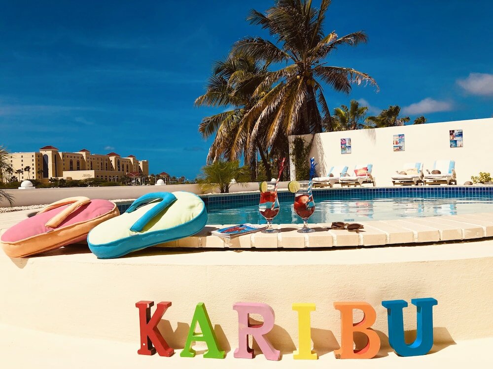 Фото Karibu Aruba Boutique Hotel