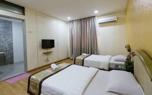 Гостиница Sabrina Court Hotel в Кота-Бару