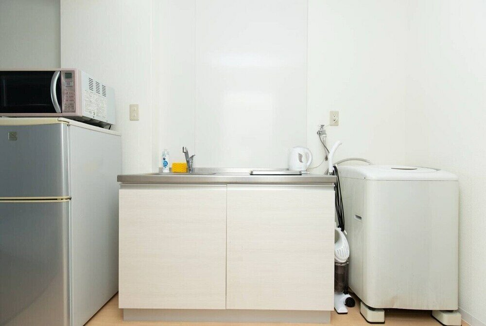 Фото Guesthouse Daikokucho Ekimae