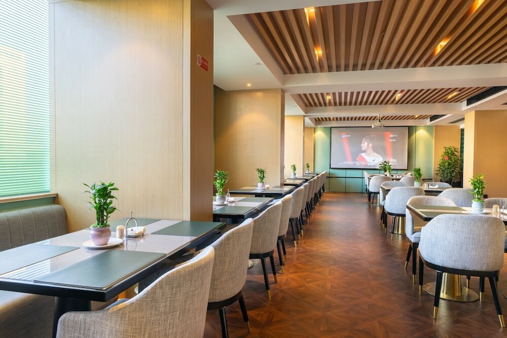 Фото Yì Wū Shì Bó Yì Měi Jū Hotel