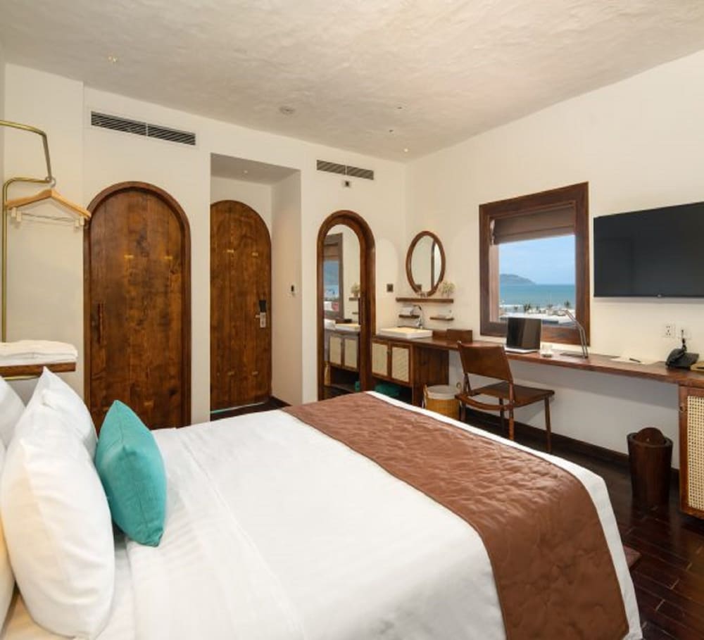 Фото Le Bouton Hotel