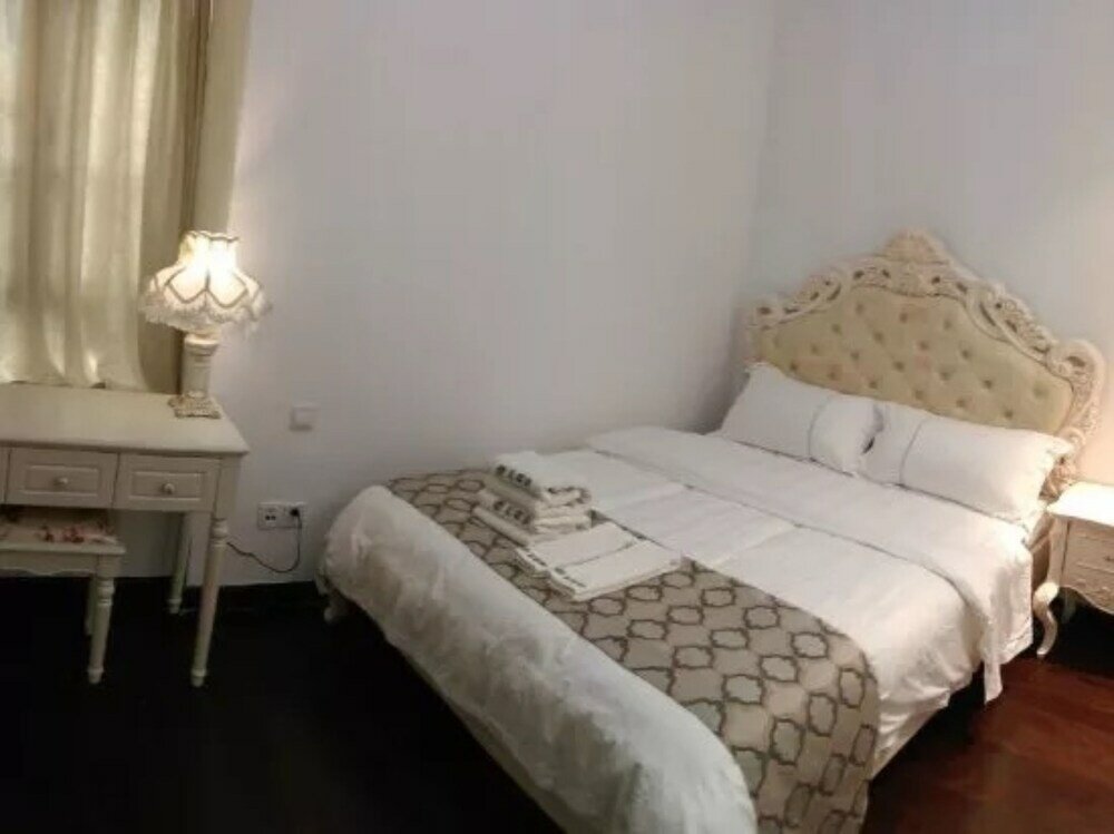 Фото Yumi Apartment-Quan Tian Xia Branch