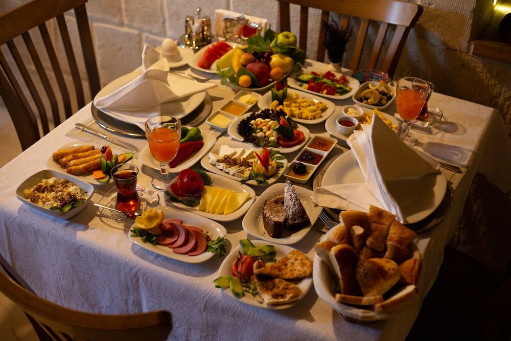 Фото Tafoni Houses Cave Hotel