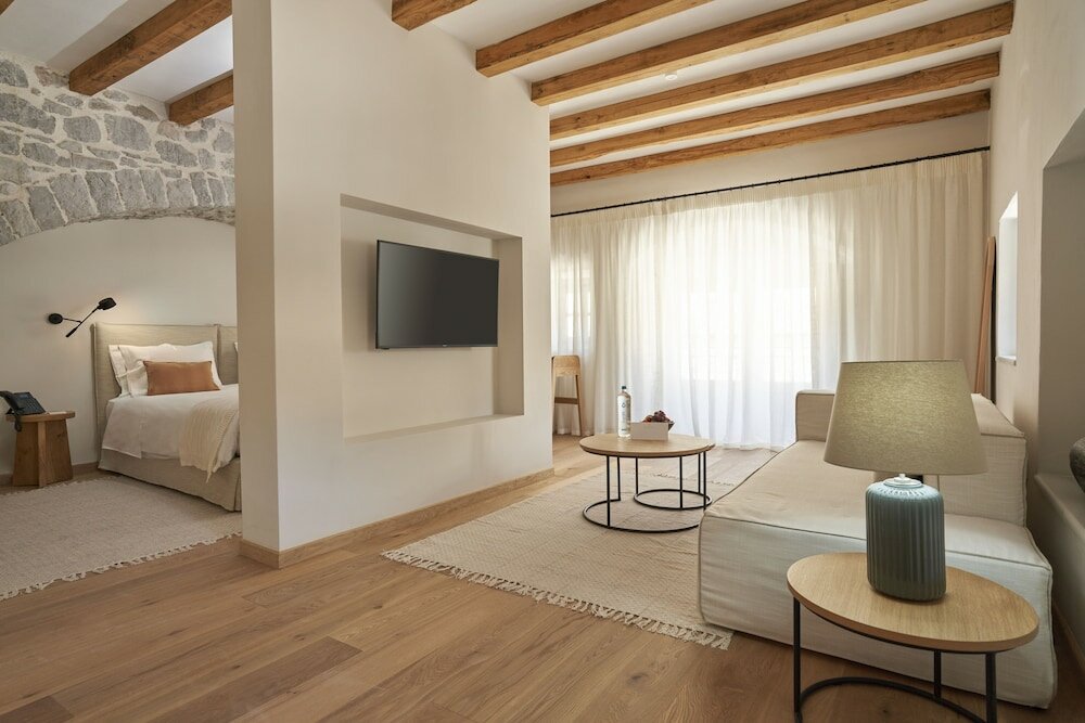 Фото Mandraki Beach Resort - Adults Only