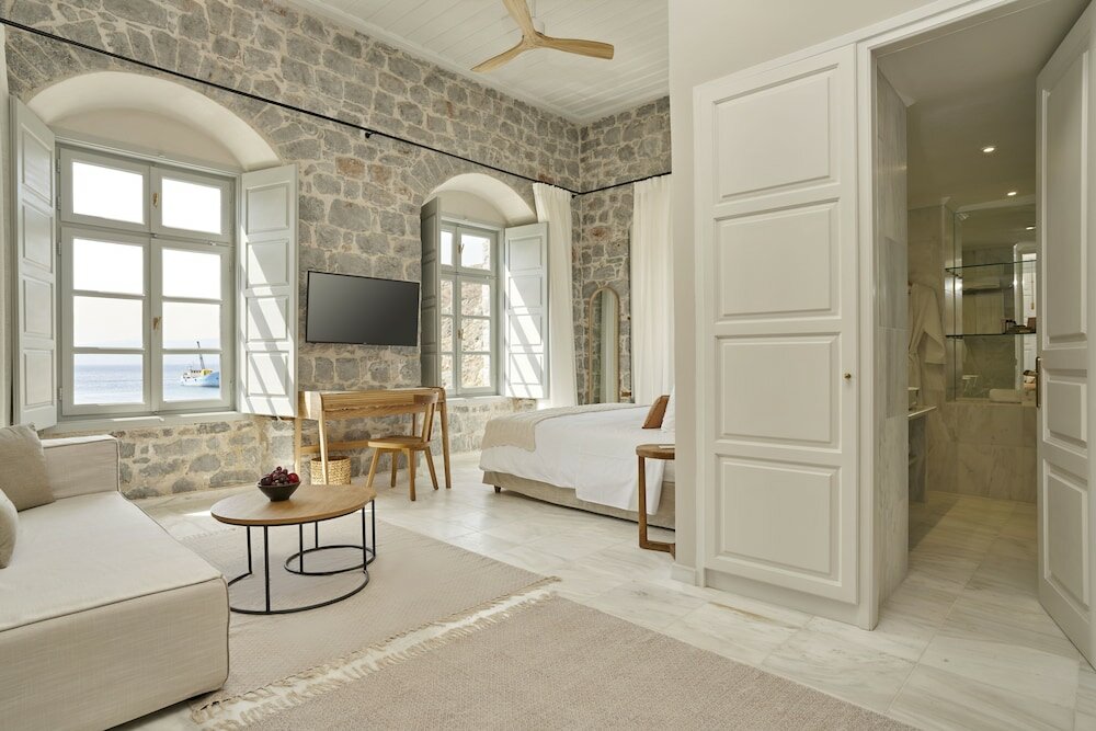 Фото Mandraki Beach Resort - Adults Only