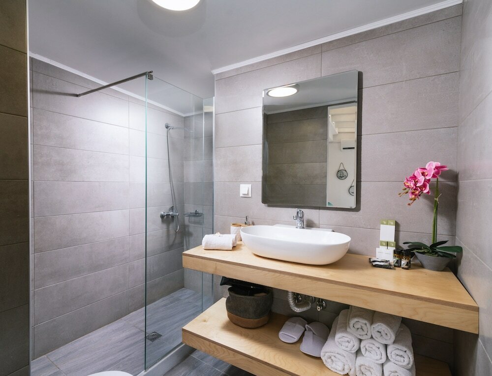 Фото Ermis Luxury Suites & Apartments